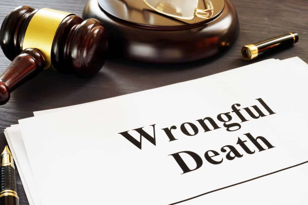 gavel and papers for a wrongful death settlement claim